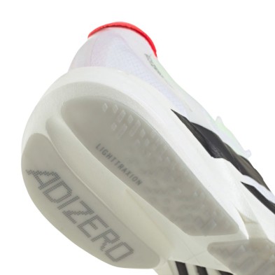 Zapatillas Adidas Adizero Adios Pro 4 Hombre blanco negro gris tecnología LIGHTTRAXION reduce el peso sin perder agarre